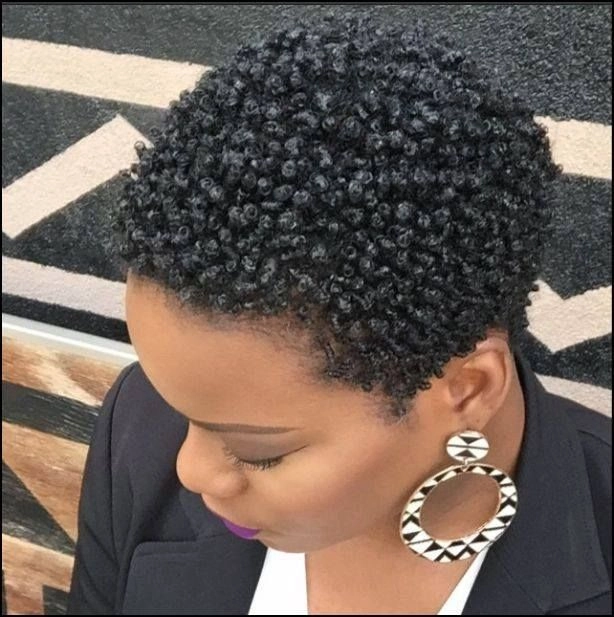 Short natural hair styled with defined coils for a casual everyday look
