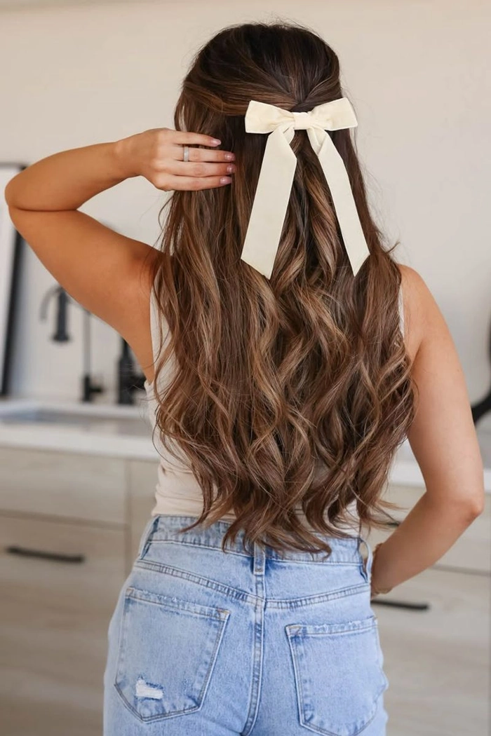 Simple barrette hairstyle complementing a preppy casual outfit with clean lines and effortless style
