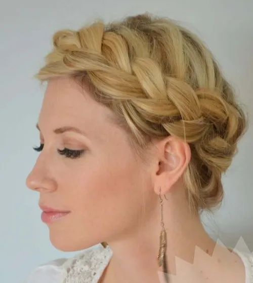 Simple crown braid hairstyle perfect for bohemian casual wear with loose waves
