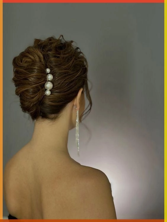 Casual hairstyle featuring a chic French barrette updo for easy, elegant looks Simple French barrette updo showcasing effortless elegance in a casual hairstyle