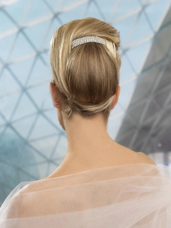 Chic casual hairstyle featuring a simple French barrette updo for everyday elegance Effortless simple French barrette updo showcasing a casual, elegant hairstyle