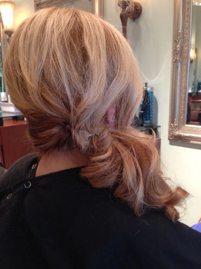 Simple side ponytail hairstyle perfect for a relaxed weekend outing at the park or beach