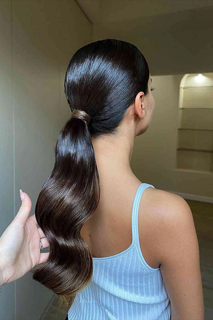 Casual hairstyle featuring a sleek low ponytail for a simple, chic look Everyday sleek low ponytail hairstyle perfect for minimalist casual outfits