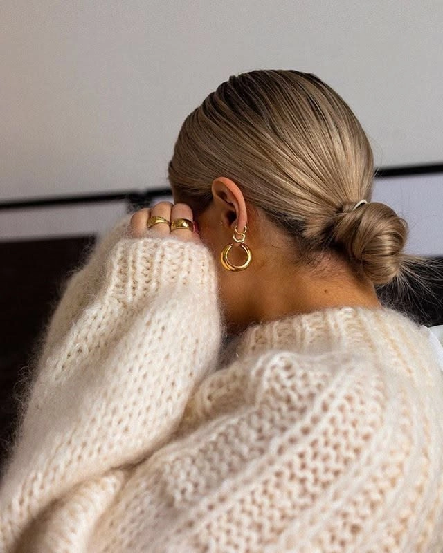 A quick slicked back low bun for a clean girl casual aesthetic hairstyle