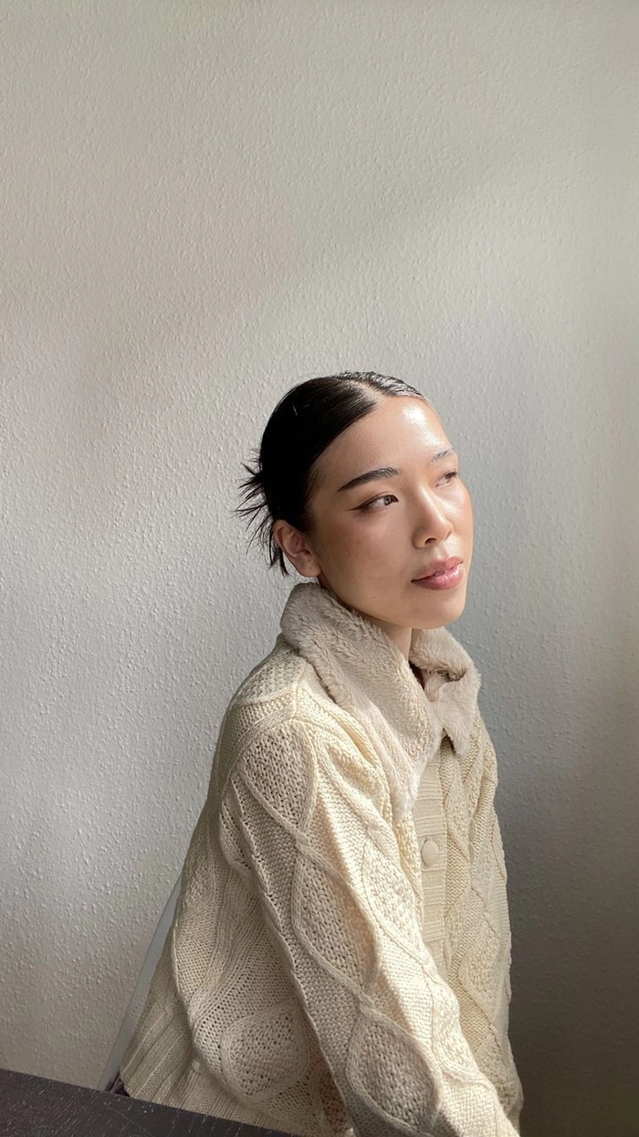 Quick and easy slicked back low bun for a clean girl casual aesthetic