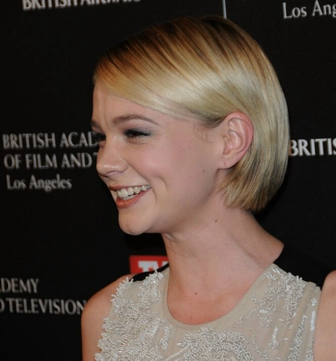 Simple tucked behind ears styling for blunt bobs, casual hairstyle idea