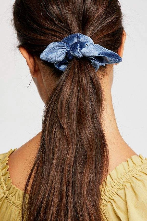 A simple velvet scrunchie updo styled for cozy winter casual days