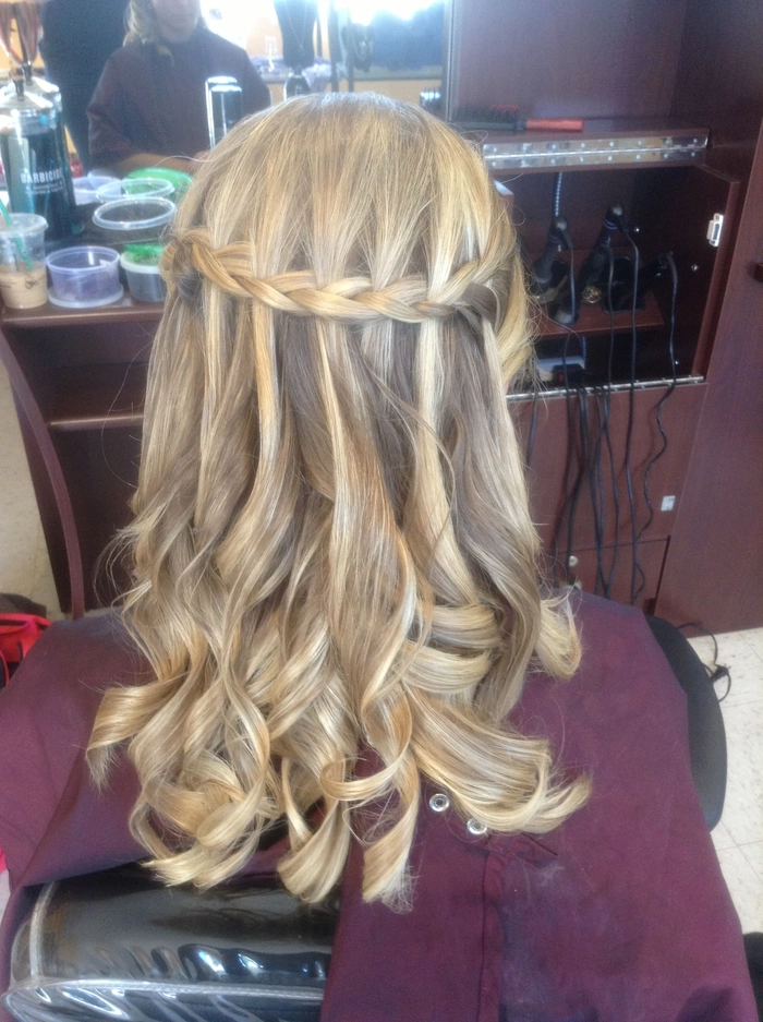 Elegant and effortless casual waterfall braid hairstyle perfect for romantic evenings Woman showcasing casual waterfall braid styles for date nights with loose curls
