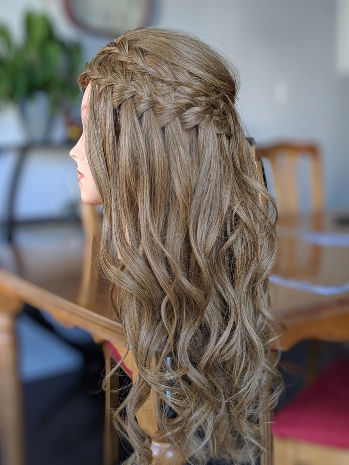 Effortless casual waterfall braid style for romantic evenings and date nights Casual waterfall braid hairstyle perfect for date night with loose waves