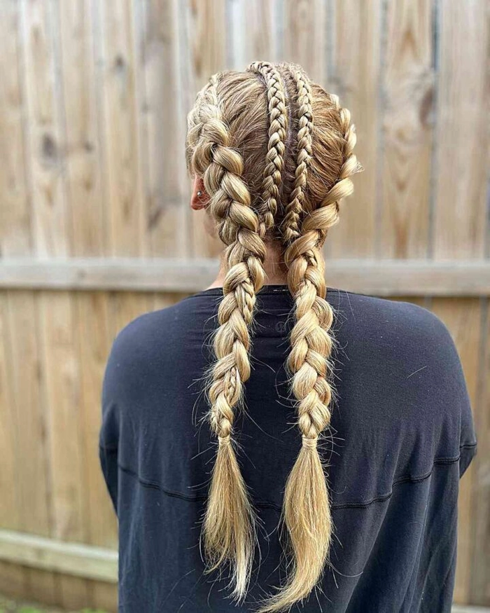 Woman doing yard work with quick braided pigtails keeping hair back
