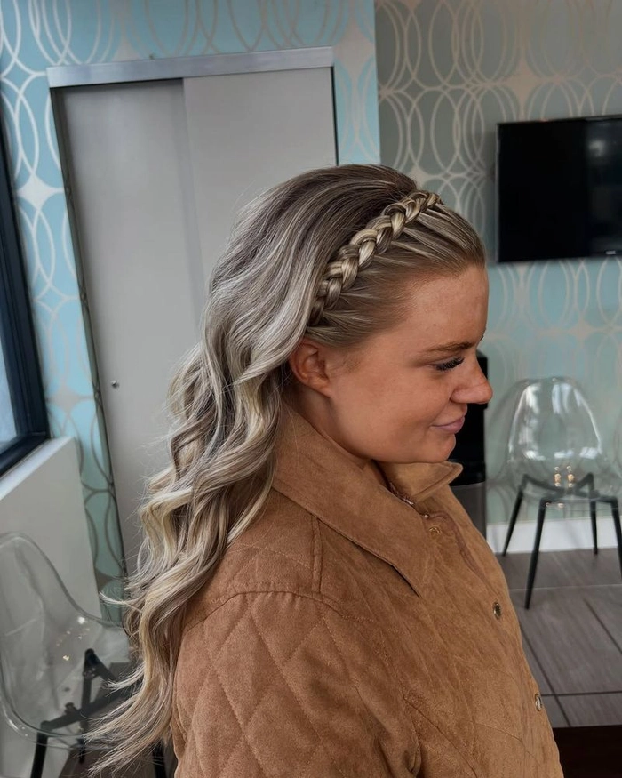 Woman wearing casual braided headband with long straight hair