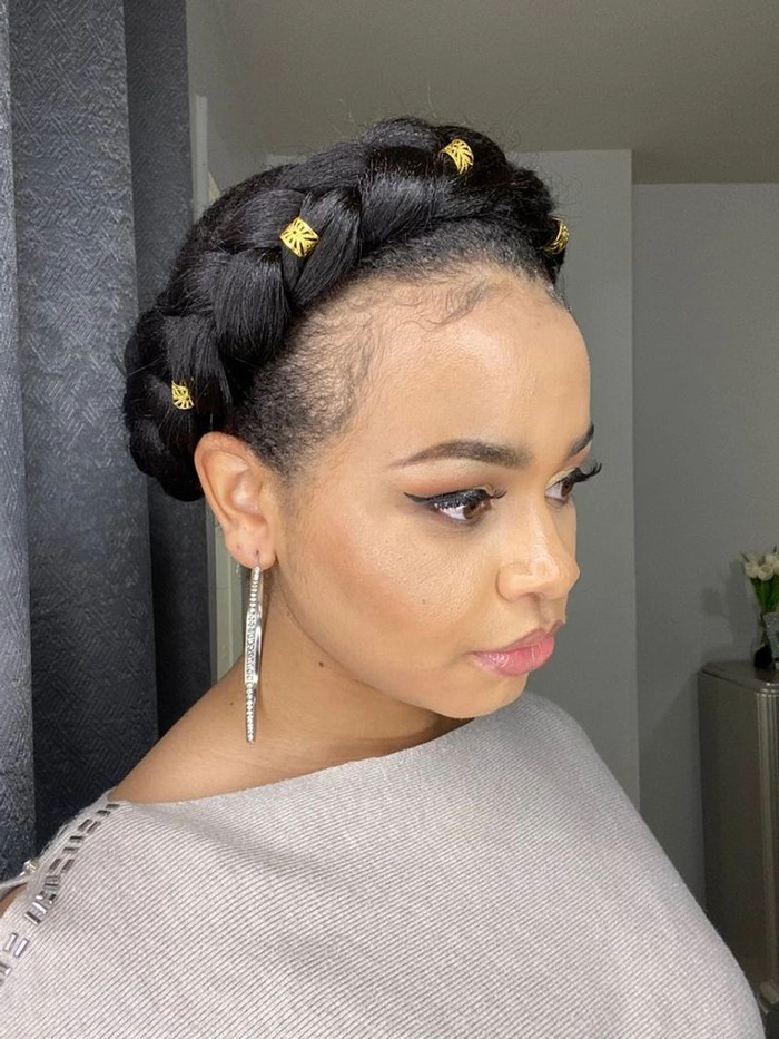 Woman with a casual halo braid hairstyle perfect for summer vacations