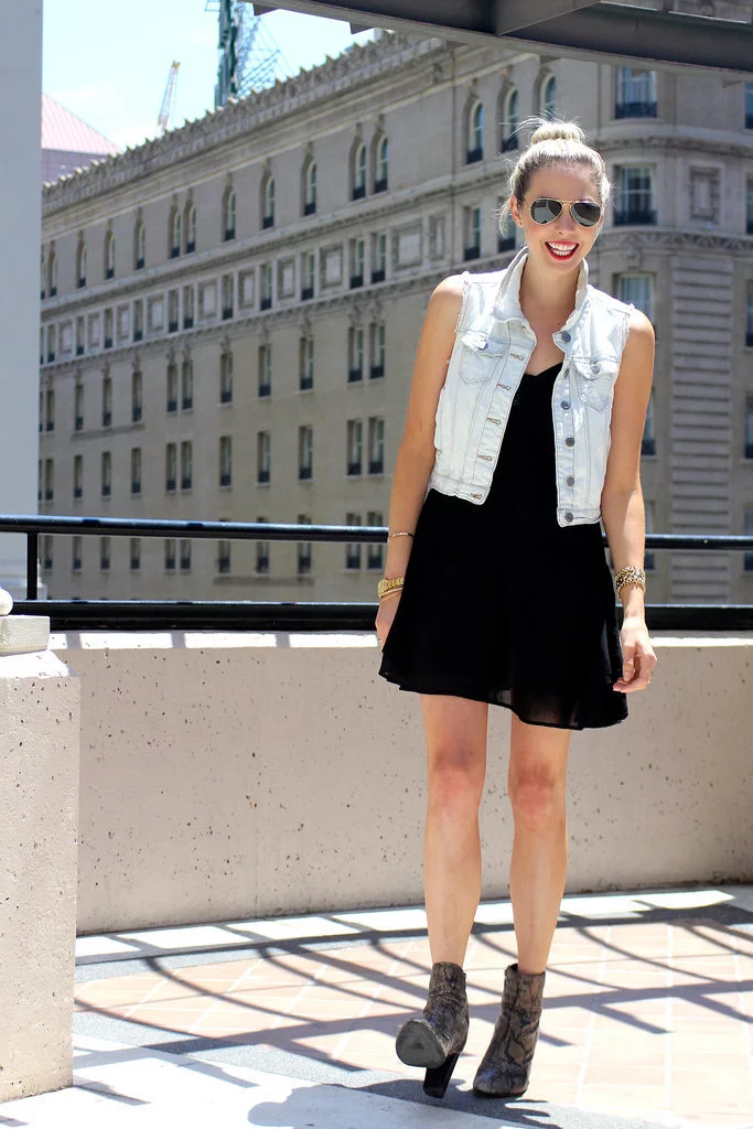 Woman with a casual relaxed top knot hairstyle perfect for humid weather