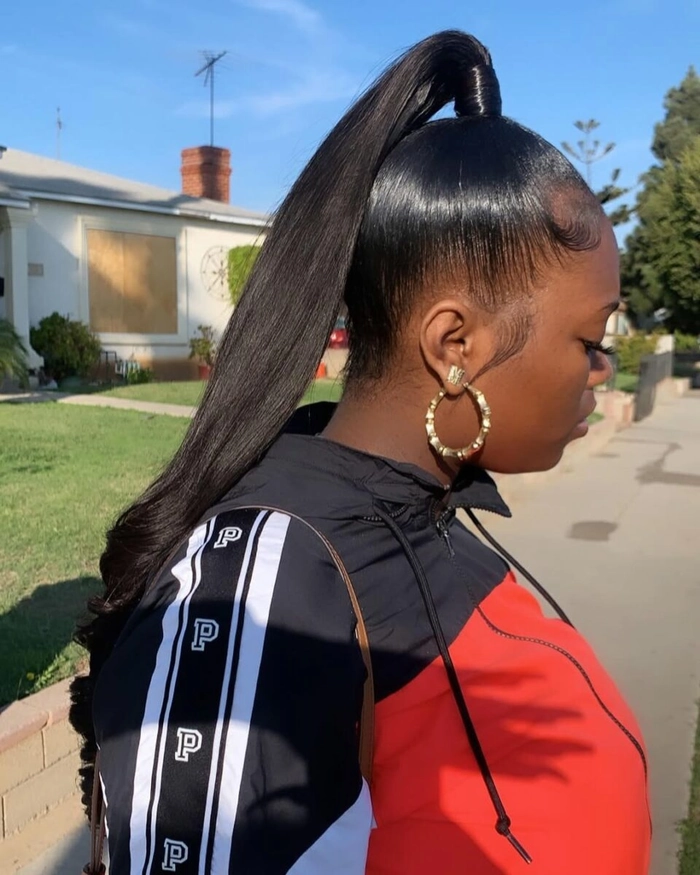 Woman wearing a casual side ponytail for a relaxed weekend look
