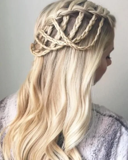 Beautiful casual waterfall braid hairstyle perfect for date night looks Woman with a casual waterfall braid styled for a romantic date night