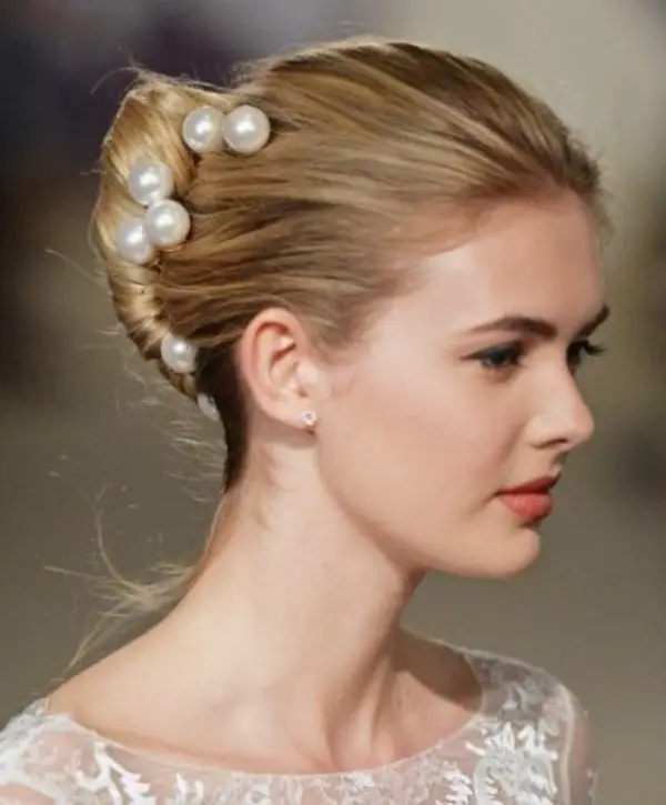 Casual hairstyles featuring a chic French barrette updo for everyday elegance Woman with simple French barrette updo showcasing effortless elegance in a casual hairstyle