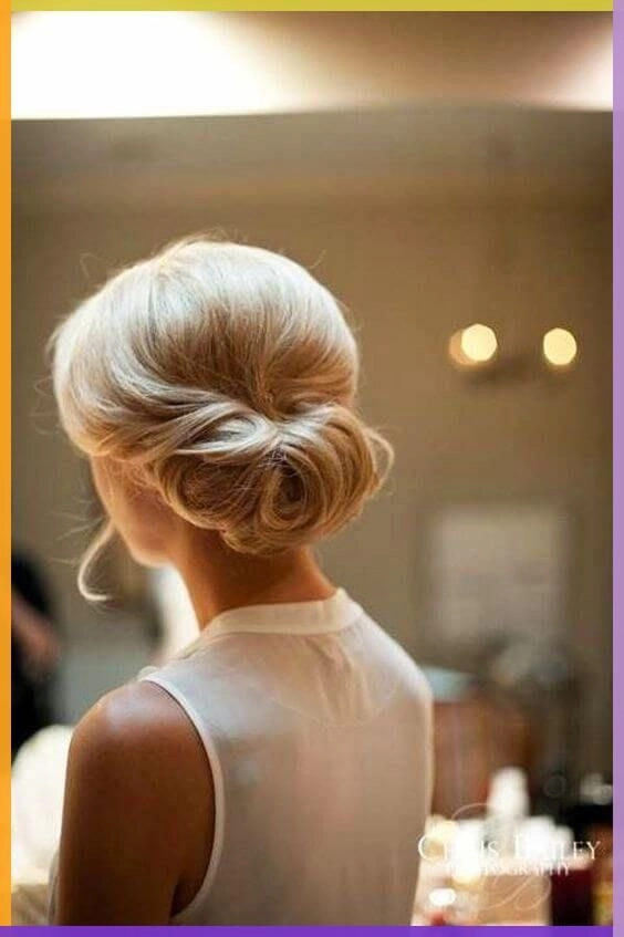 Effortless elegance with a simple French barrette updo in casual style image 6 Woman with simple French barrette updo showcasing effortless elegance for casual hairstyles