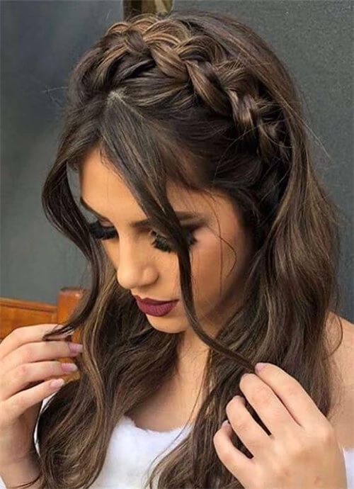 Woman with long straight hair wearing a casual braided headband hairstyle