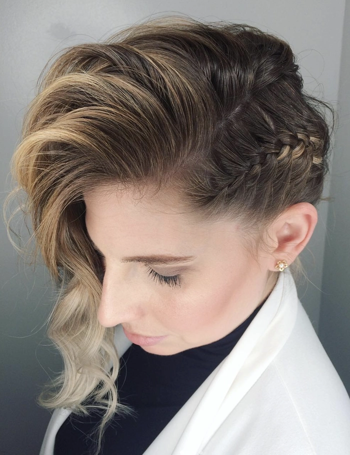 A woman with an effortless loose side braid strolling through an autumn park