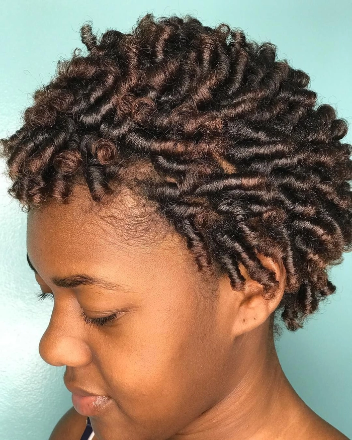 Woman with transitioning natural hair in a curly pineapple updo, perfect for daily wear and protecting ends