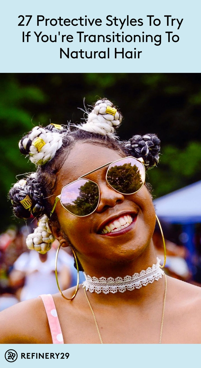 Woman with transitioning natural hair wearing a twisted updo as a simple everyday protective style