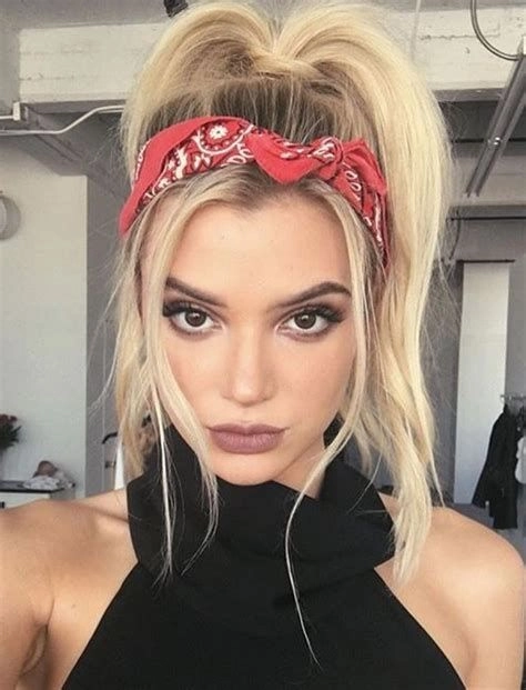 Casual hairstyle idea featuring a bandana ponytail for a vintage look Woman with a quick bandana ponytail style showcasing retro casual vibes
