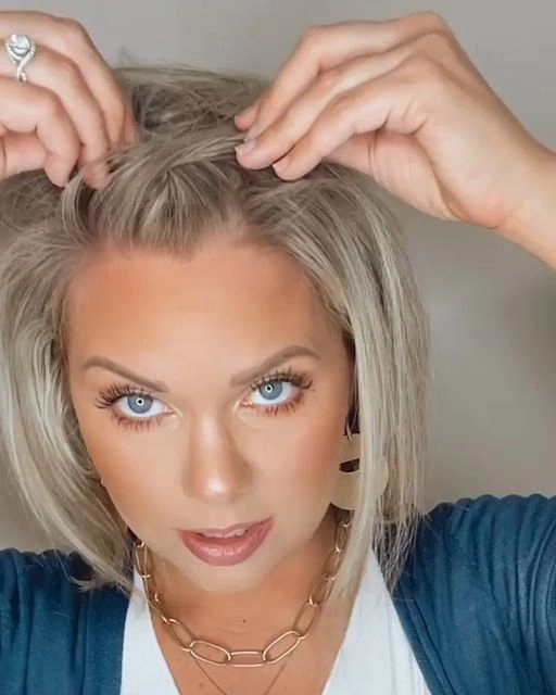 Casual quick braided bangs perfect for easy, stylish hair management Woman with quick braided bangs hairstyle keeping hair out of face for a casual look