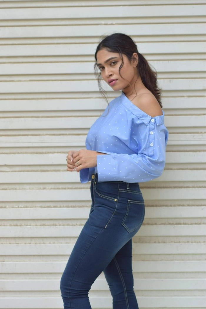 Woman sporting a quick high ponytail variation perfect for casual streetwear