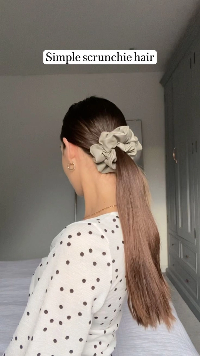 Woman with a quick scrunchie hairstyle perfect for 90s casual aesthetics