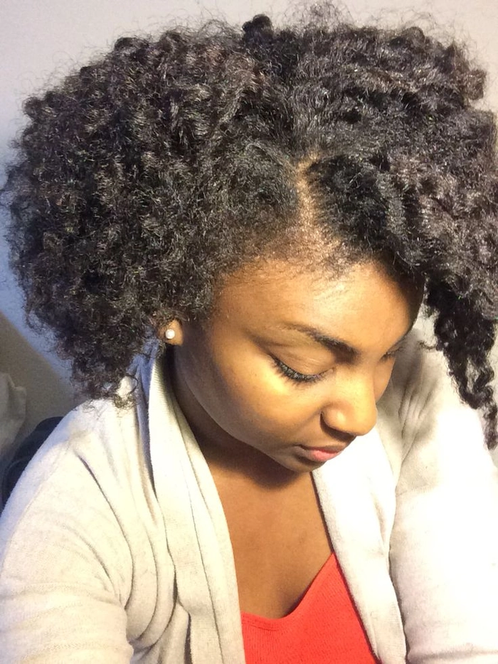 Casual relaxed braid out hairstyle perfect for natural coil texture from image 13 Woman showcasing a beautiful relaxed braid out hairstyle on her natural coils