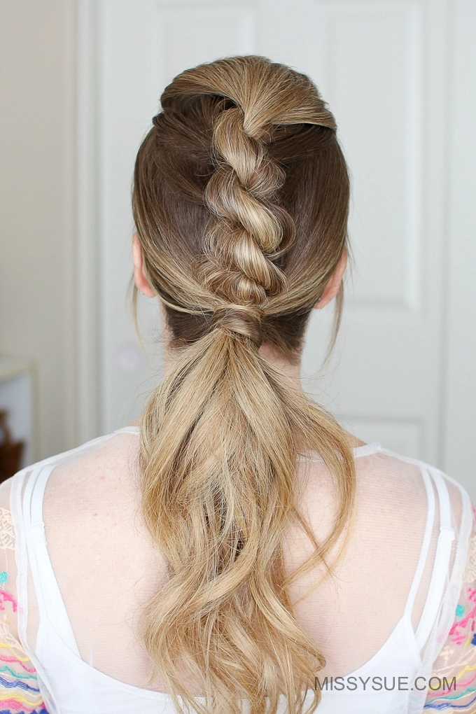 Woman wearing a simple rope braid ponytail perfect for sporty casual days