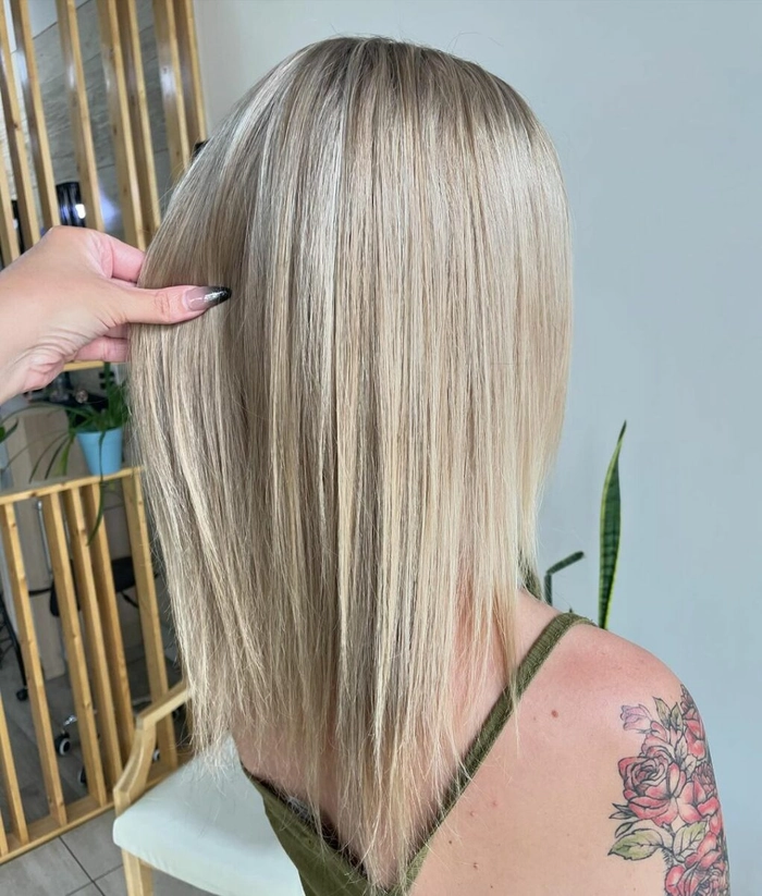Casual hairstyle ideas for shoulder length hair with easy styling tips Woman with everyday shoulder length hair styling for minimal effort in a casual setting