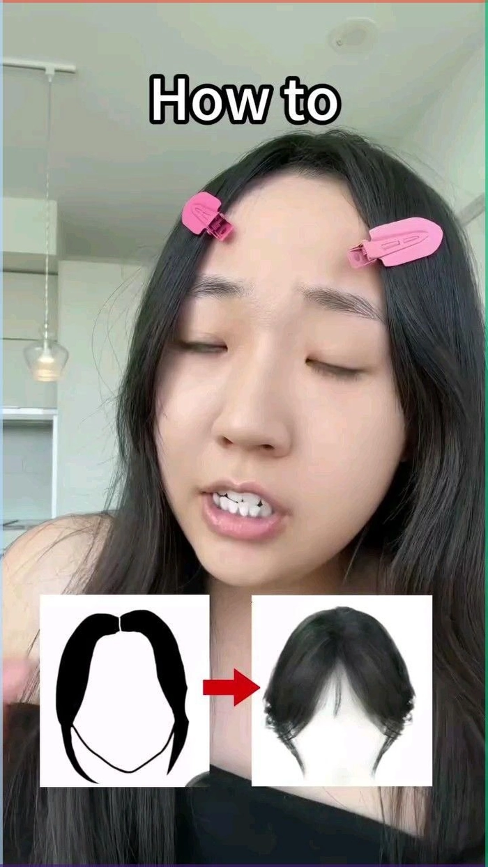 How to Use Simple Clip In Bangs for an Easy Everyday Hairstyle Makeover Woman styling her hair with a simple clip in bangs for a quick casual makeover at home