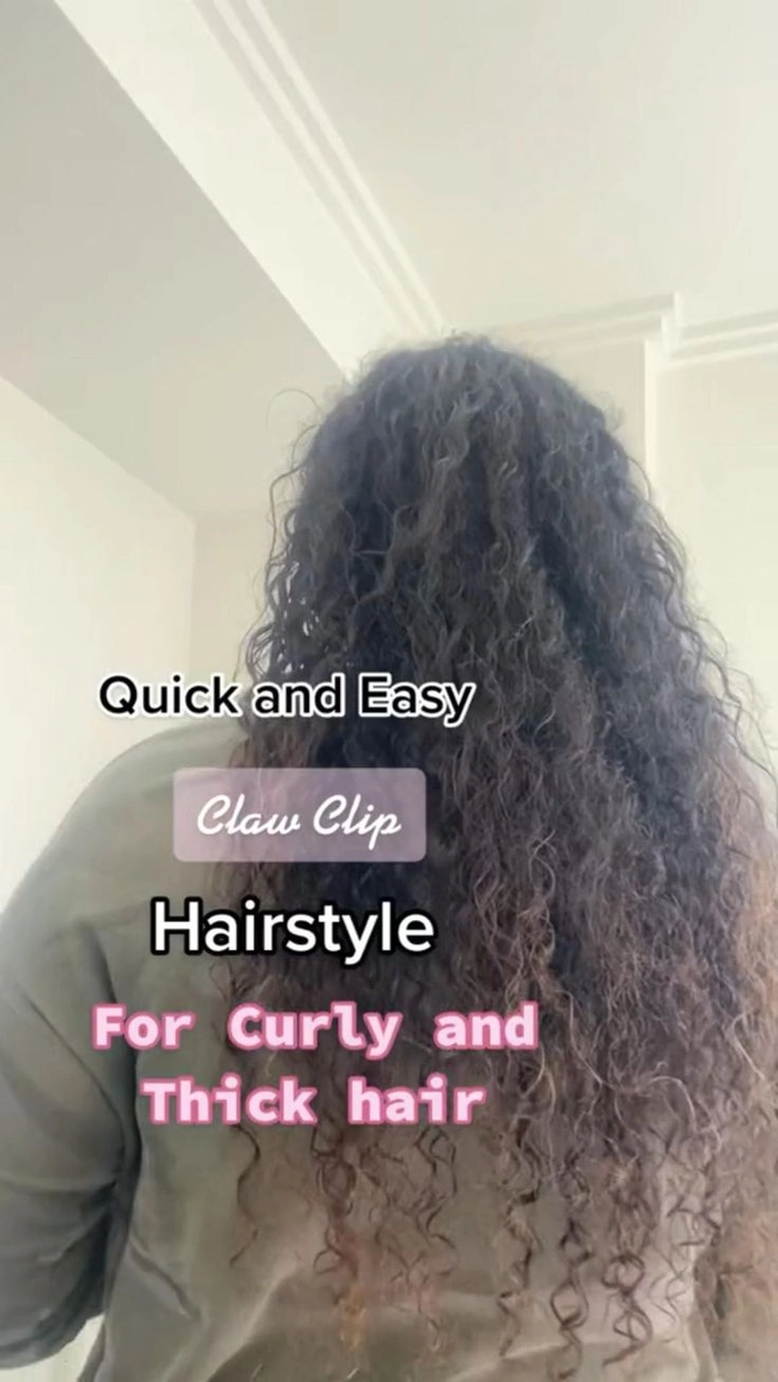 Woman with thick hair styled in a casual quick claw clip hairstyle