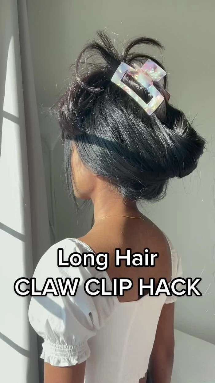 Woman with thick hair styled in a quick claw clip for a casual look