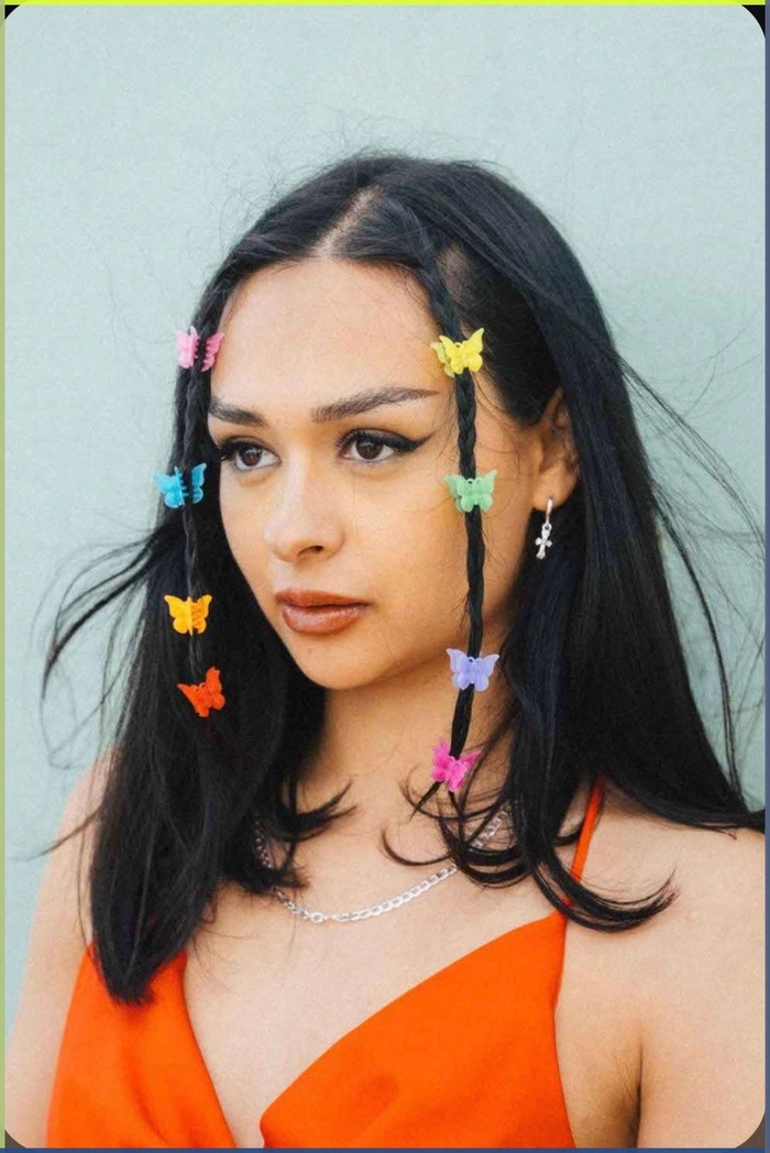Y2K Casual Hairstyle with Butterfly Clip Woman with a simple butterfly clip hairstyle for Y2K casual trend