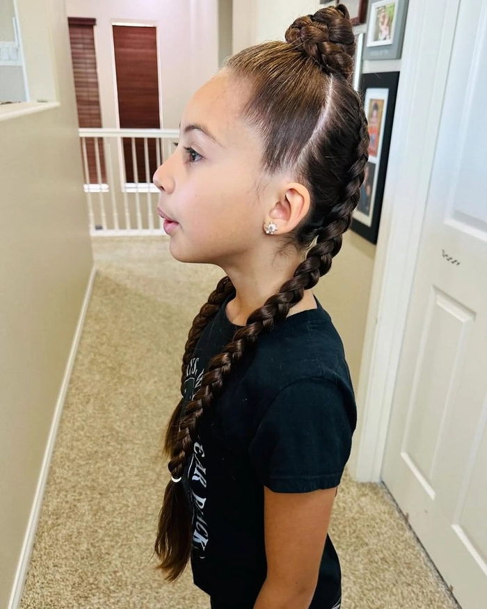 Young woman with casual pigtail braids for youthful everyday looks
