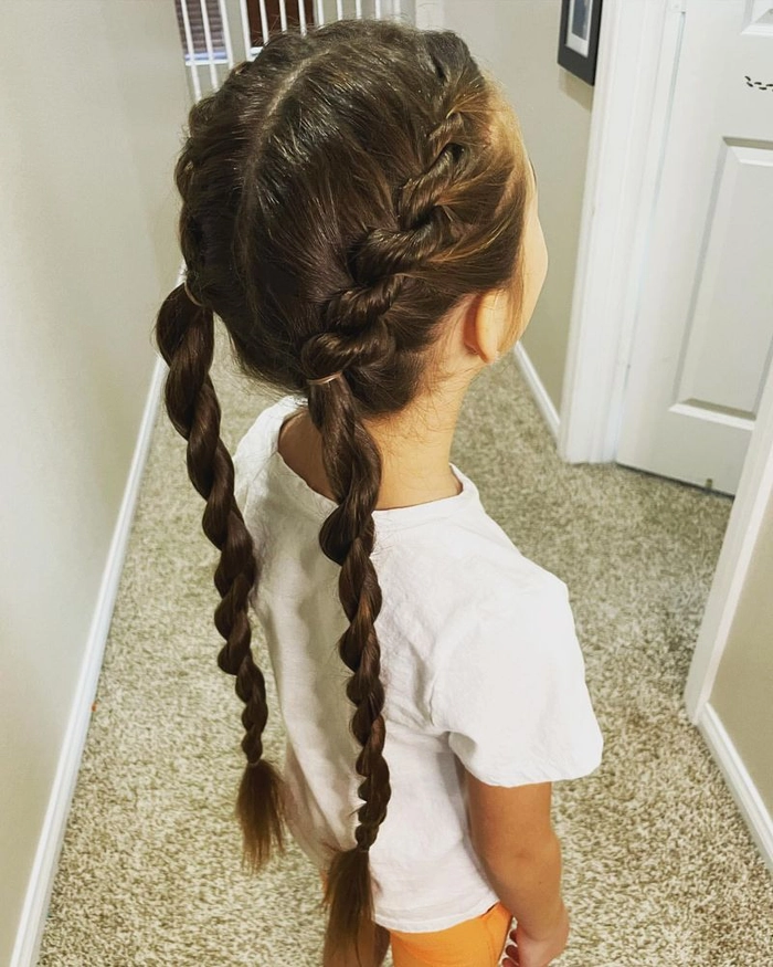 Young woman with casual pigtail braids for youthful everyday looks