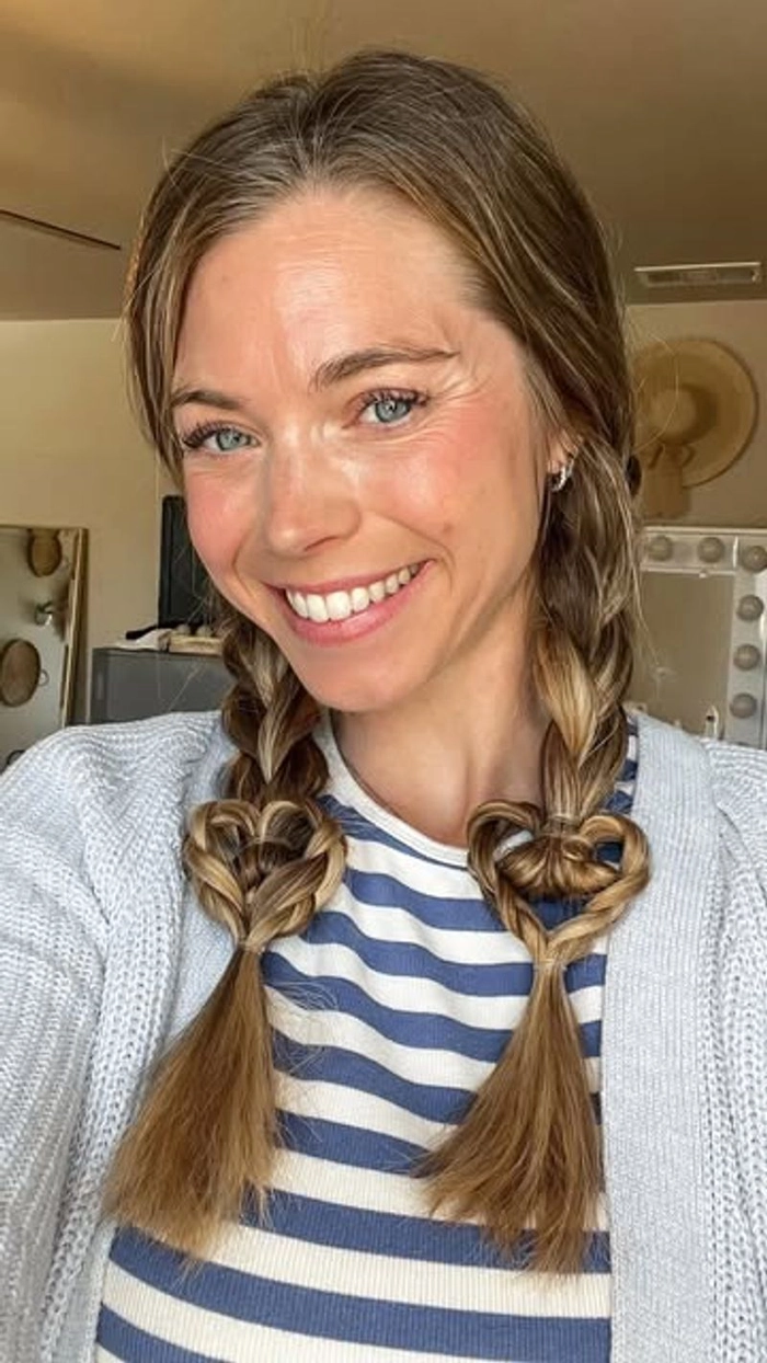 Young woman with casual pigtail braids showcasing a fresh and youthful everyday hairstyle