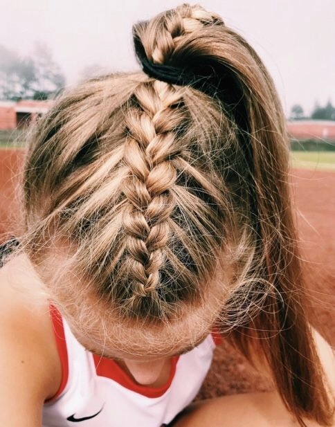 Casual double braids hairstyle for active lifestyles and sports Young woman with casual double braids suitable for athletic activities
