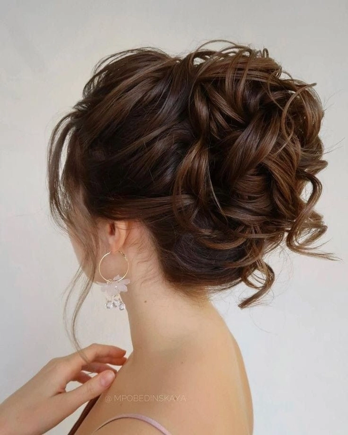 Date night hair inspiration featuring an elaborate updo perfect for formal occasions Advanced intricate evening updo with twisted detailing for a special date night