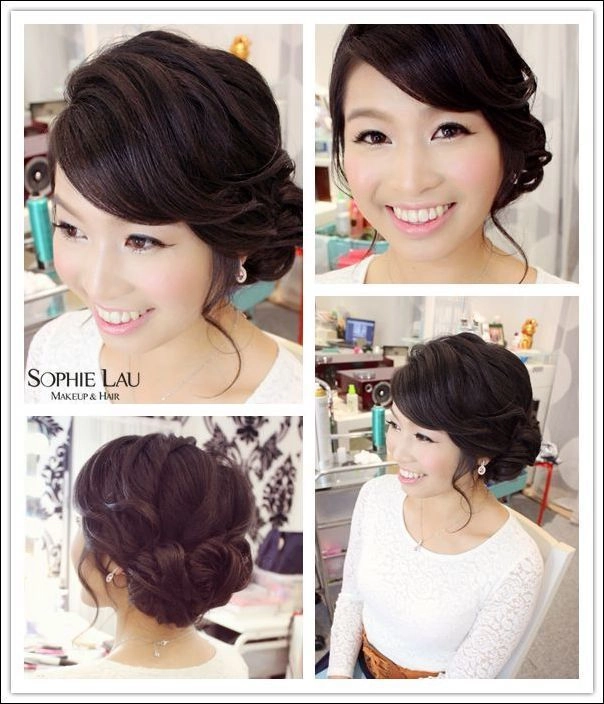 Sleek Asian hair evening updo with a glossy finish and elegant silhouette