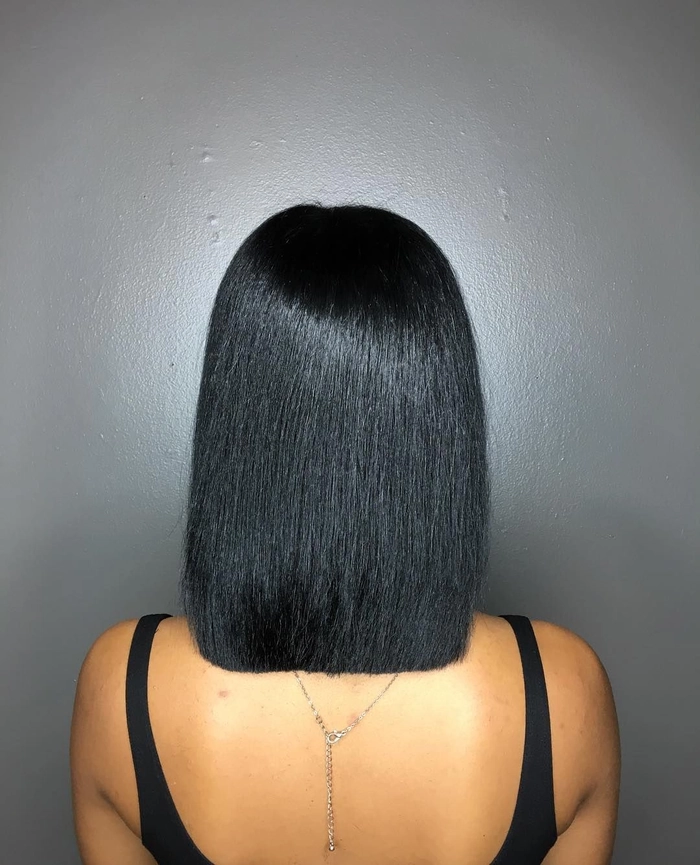 Sleek blunt cut hairstyle for a sophisticated date night look Blunt cut sleek date night hairstyle with smooth straight texture