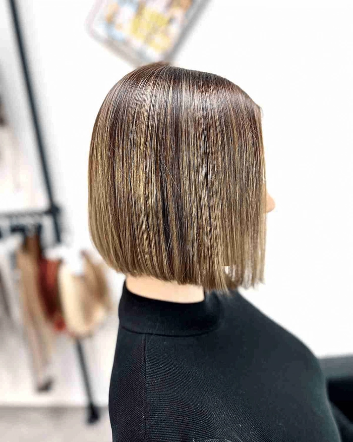 Blunt cut sleek date night styles for a sophisticated look Sleek blunt cut date night hairstyle with polished finish