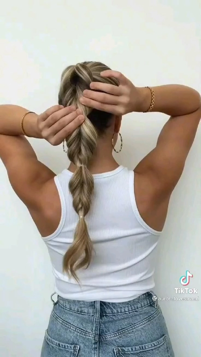 Braided date night hairstyle for long hair with elegant twists