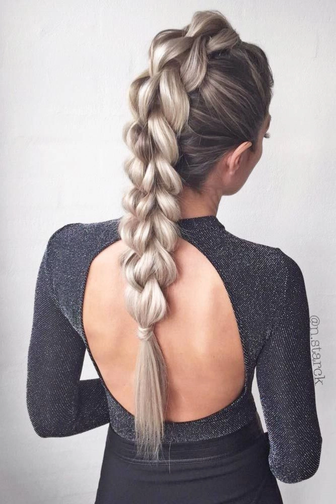 Braided date night hairstyle with soft waves on long hair