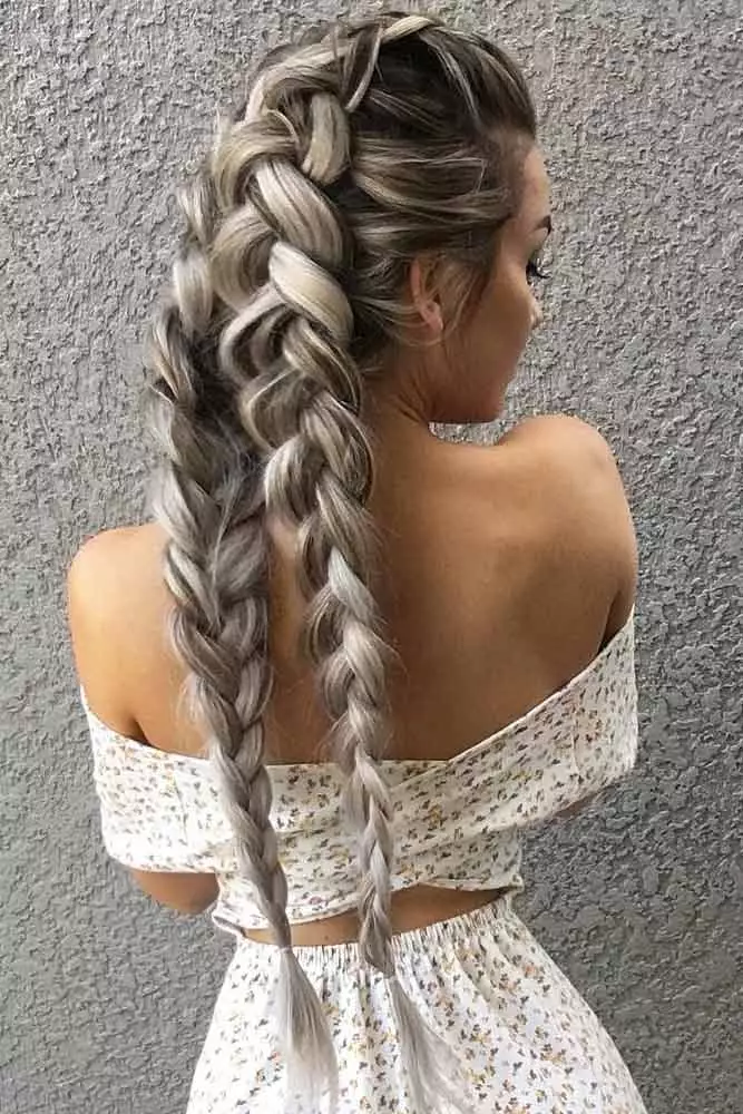 Elegant braided date night look for long hair with a side braid and loose curls