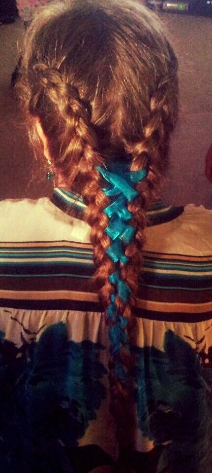 Elegant Ribbon-Woven Braid for Date Night Romantic braided date night hairstyle with ribbon weaving for a special evening