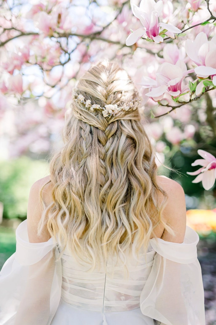 Elegant date night braids with gold chain accents Romantic braided hairstyle with delicate gold chains woven through for a date night look