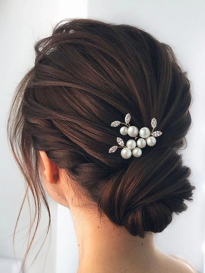Romantic updo with pearl hairpins for date night